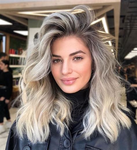 blonde hair dark roots|blonde bob with black roots.